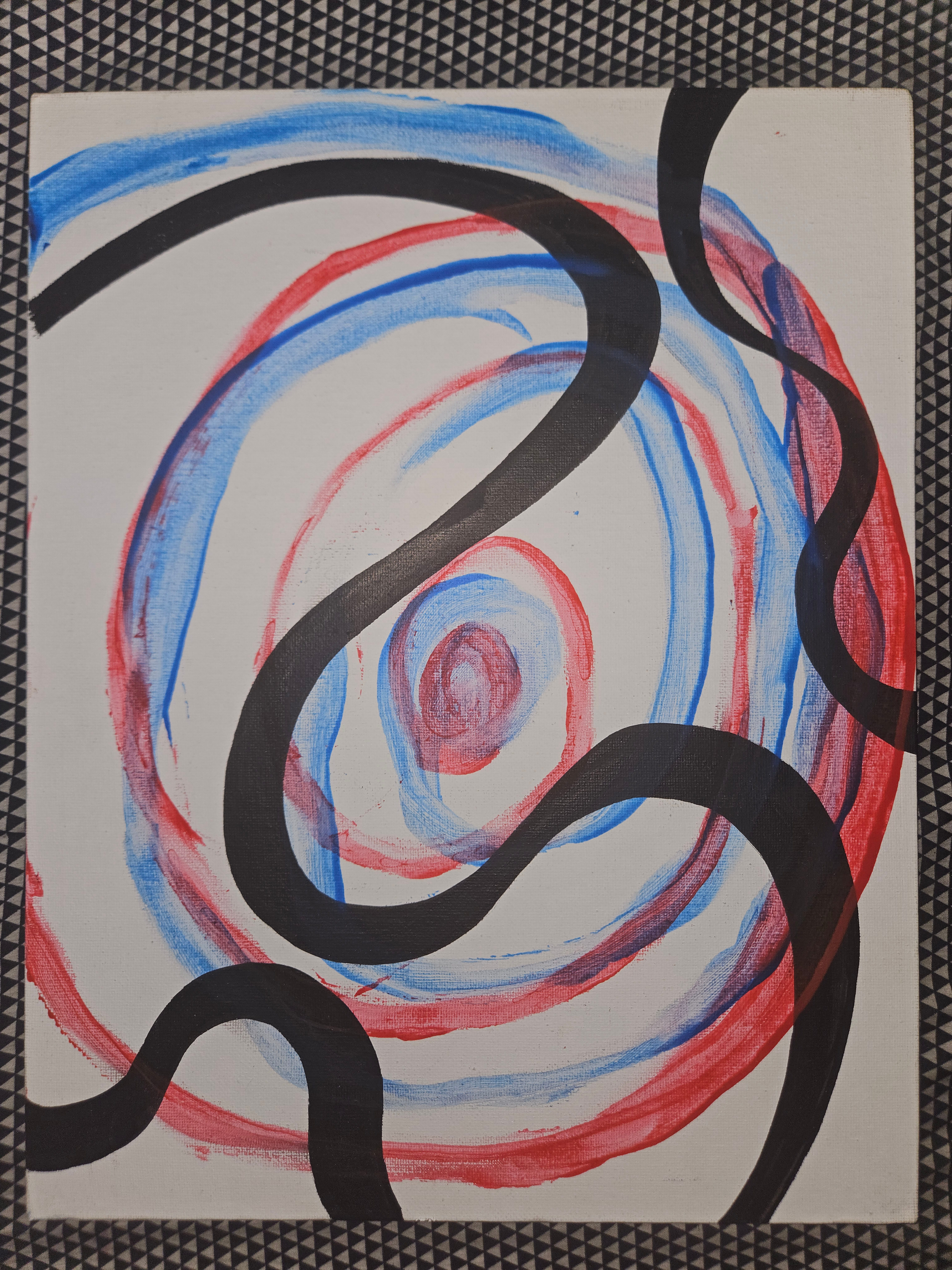Spiraling, a painting featuring thick wavy black lines and two swirls colored red and blue.